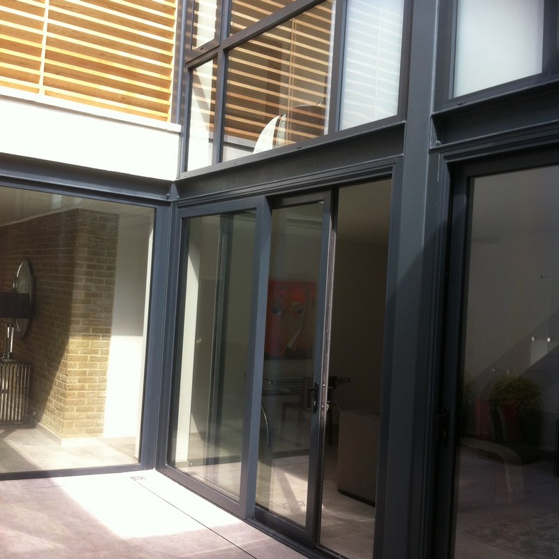 Anthracite aluminium sliding patio doors fitted in Brockley