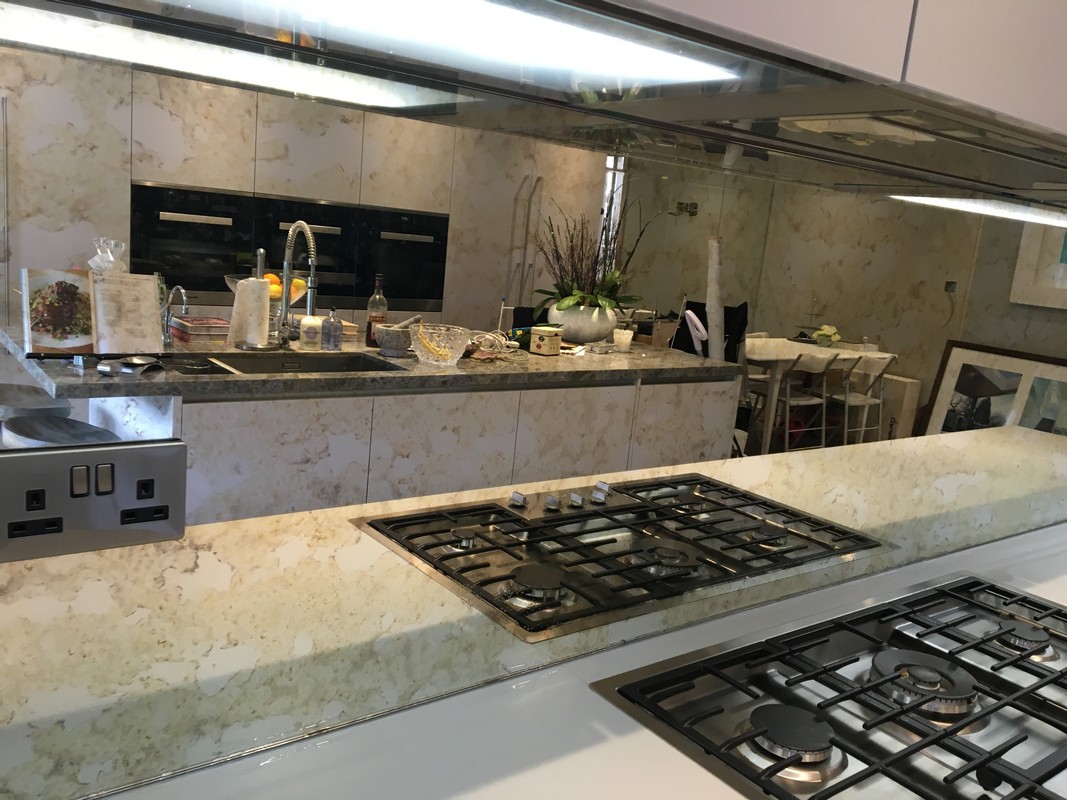 Mirror glass splashback in Brockley luxury kitchen
